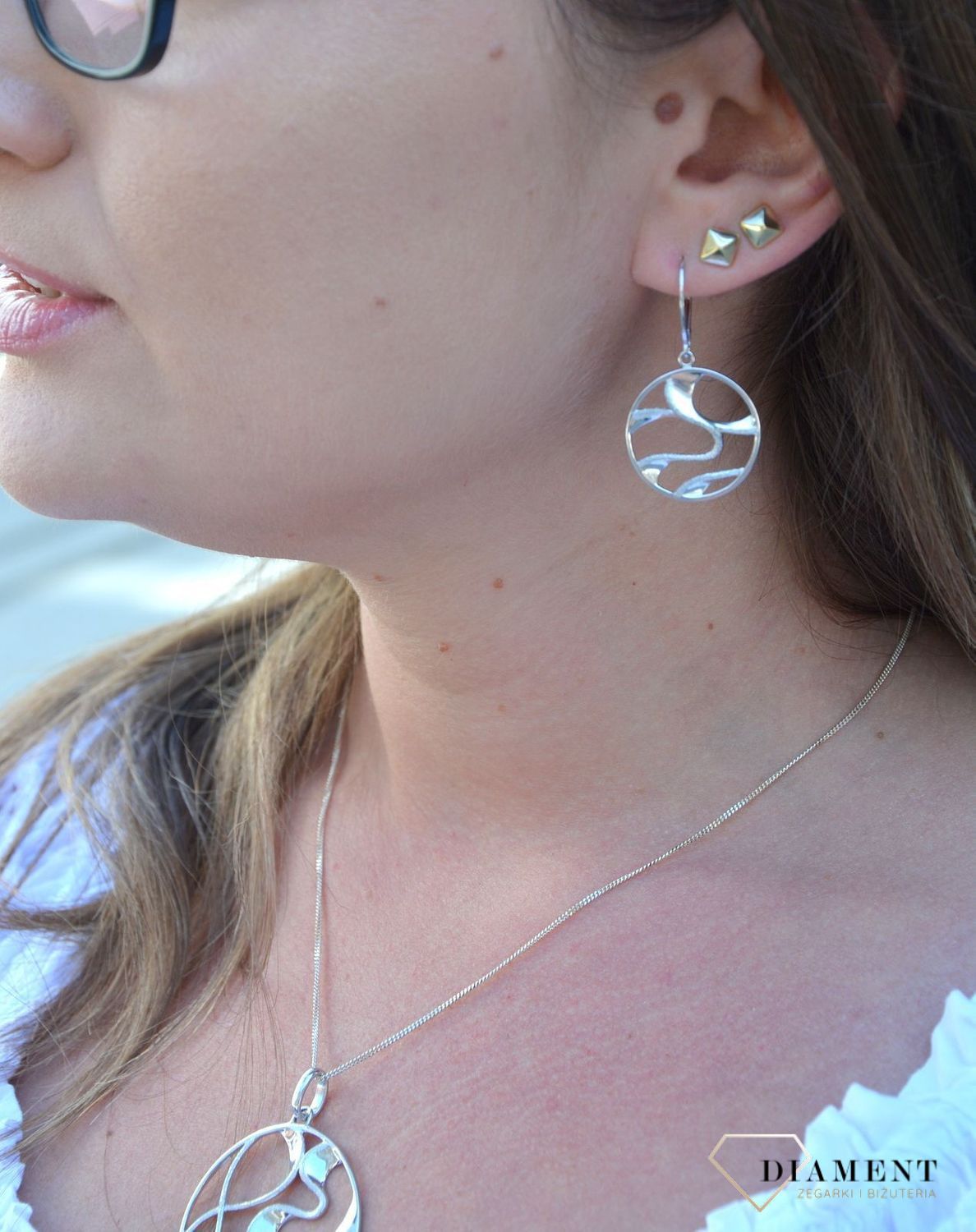 Kolczyki srebrne wiszące koła z falami 27127833-0500..jpg