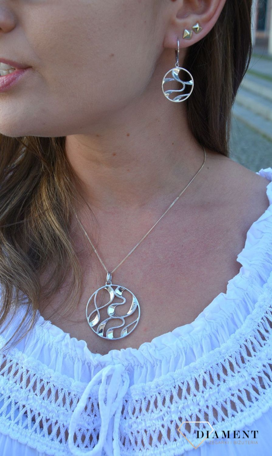 Kolczyki srebrne wiszące koła z falami 27127833-0500..jpg