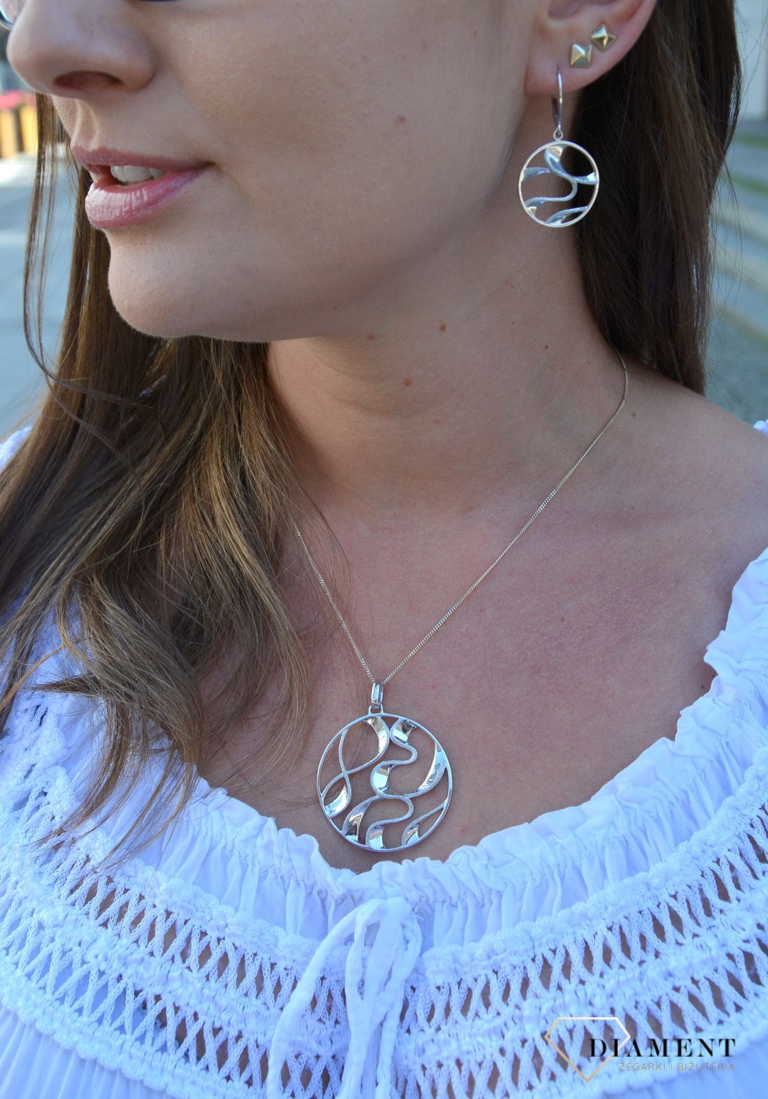 Kolczyki srebrne wiszące koła z falami 27127833-0500..jpg