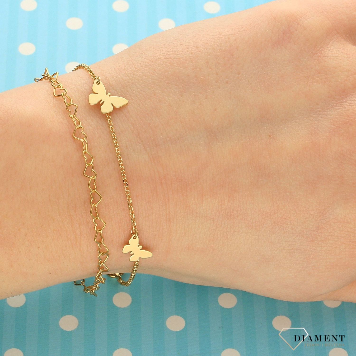 Srebrna bransoletka pozłacana z motylkami 272433220240.jpg