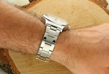 TIMEMASTER 27405 – elegancki zegarek męski z białą tarczą, stalową bransoletą i datownikiem. Wodoszczelność 100M, mechanizm kwarcowy, gwarancja 24 miesiące. Sprawdź ofertę!5.jpg
