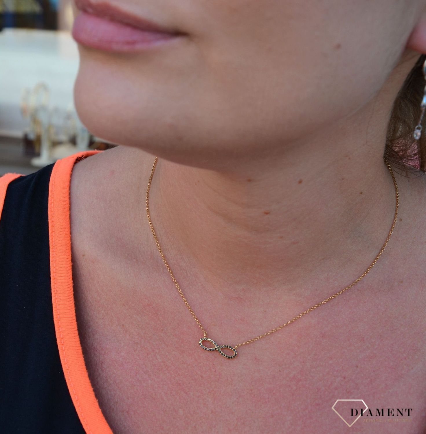 Srebrny naszyjnik pozłacany ze znakiem nieskończoności 274130580300.jpg