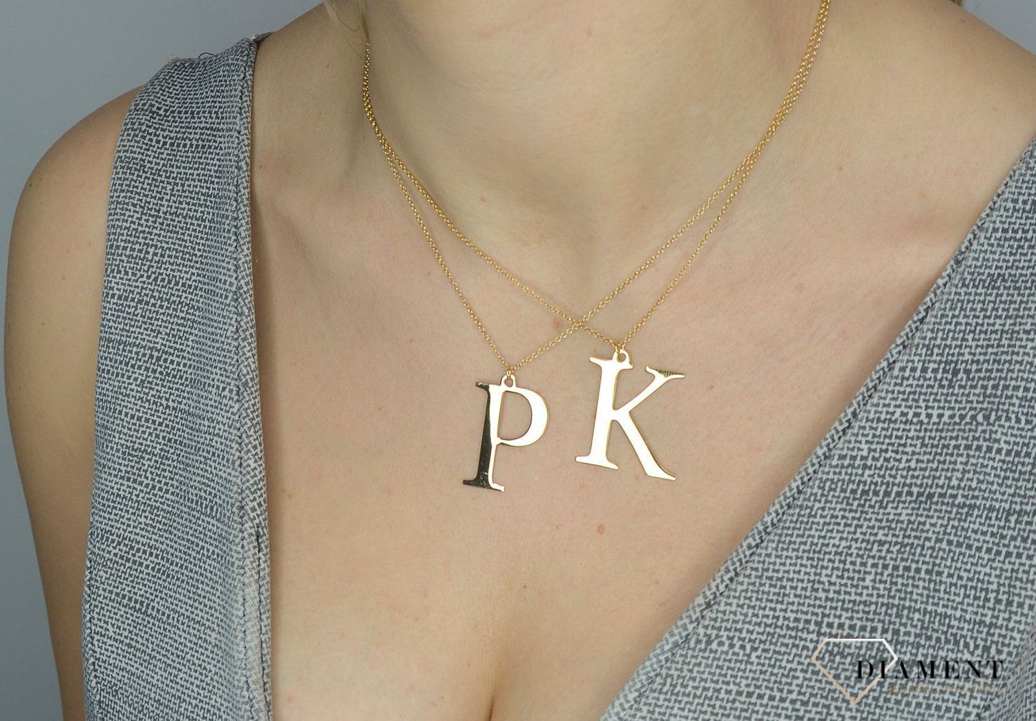 Srebrny naszyjnik pozłacany literka K 274631110480.jpg