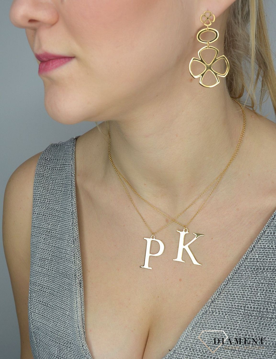 Srebrny naszyjnik pozłacany literka K 274631110480.jpg