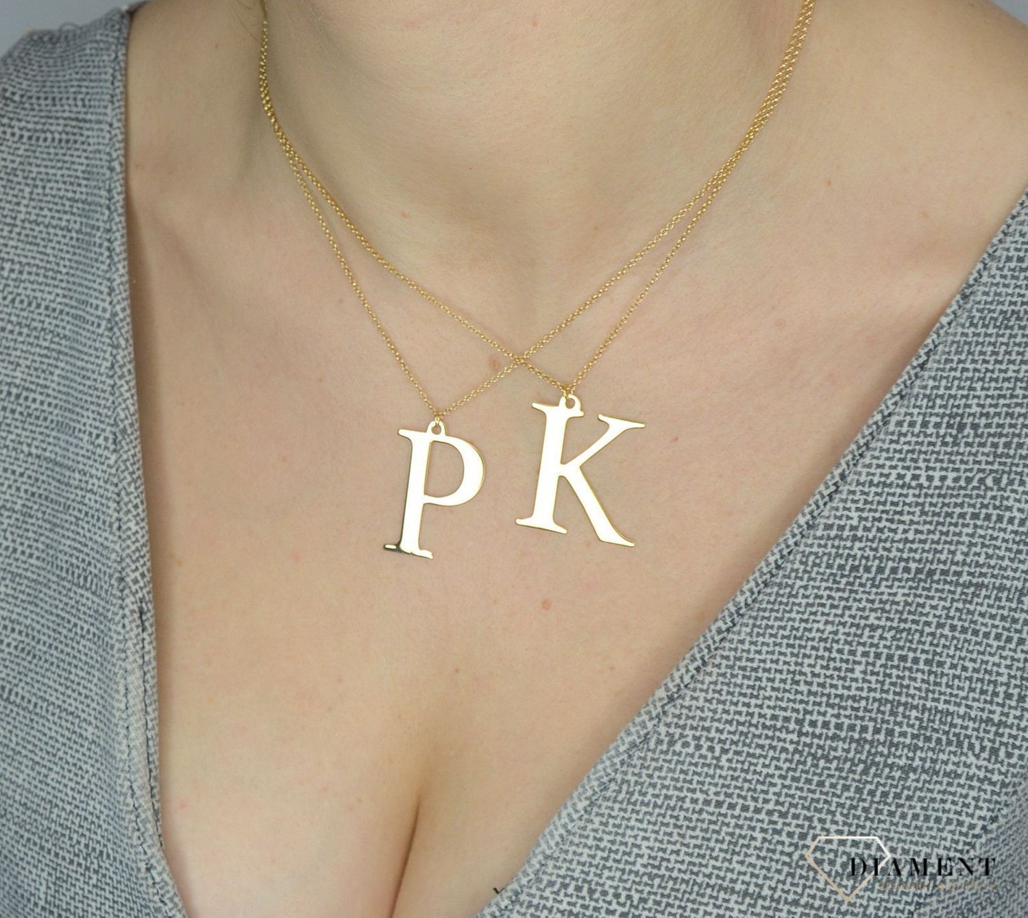 Srebrny naszyjnik pozłacany literka K 274631110480.jpg