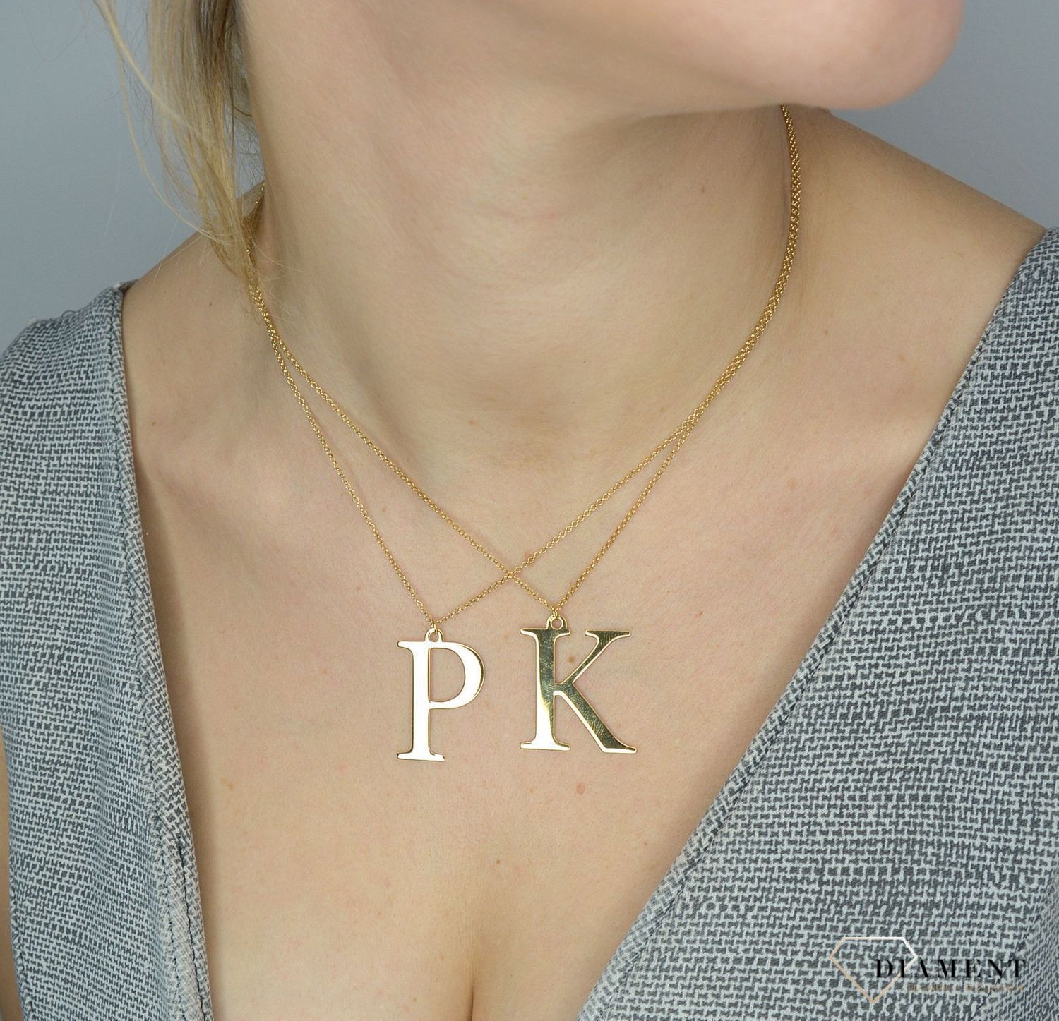 Srebrny naszyjnik pozłacany literka K 274631110480.jpg