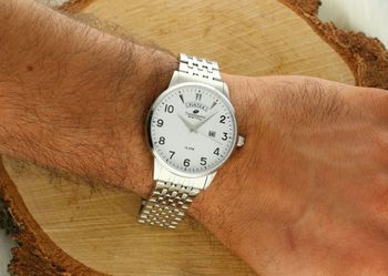 Stylowy zegarek TIMEMASTER 27505 z białą tarczą, pełnym datownikiem i stalową bransoletą. Kwarcowy mechanizm, wodoszczelność 100M, gwarancja 3 lata. Sprawdź teraz!2.jpg