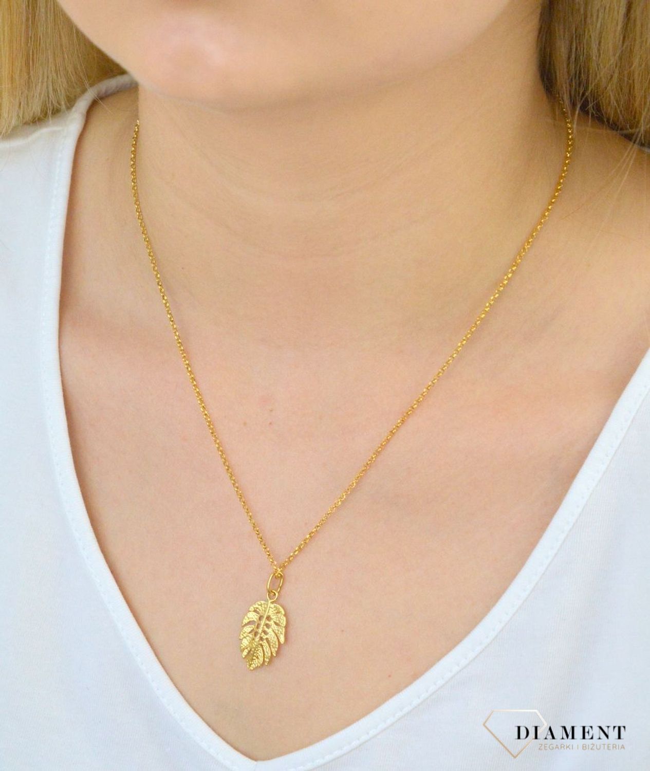 Zawieszka srebrna pozłacana listek 276235480230. Zawieszka srebrna pozłacana. Zawieszka srebrna listek. Zawieszka srebrna w kształcie listka. Zawieszka srebrna pozłacana o modnym wzorze. Zawieszka idealna n.jpg