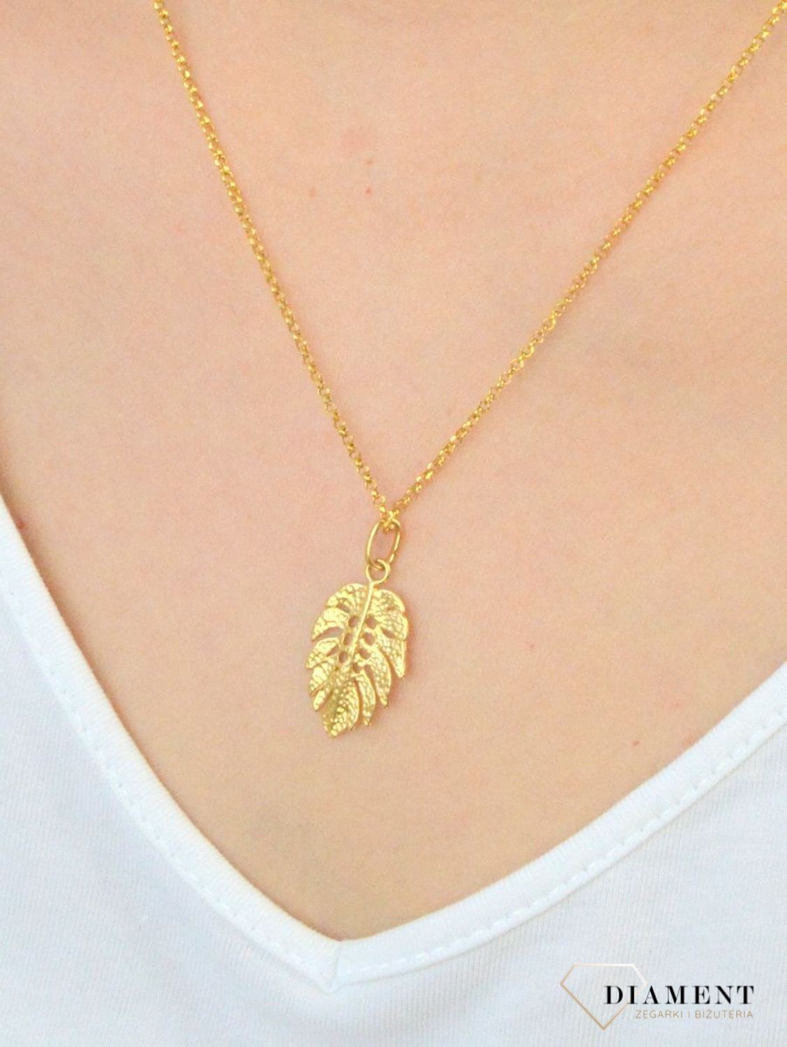 Zawieszka srebrna pozłacana listek 276235480230. Zawieszka srebrna pozłacana. Zawieszka srebrna listek. Zawieszka srebrna w kształcie listka. Zawieszka srebrna pozłacana o modnym wzorze. Zawieszka idealna n.jpg