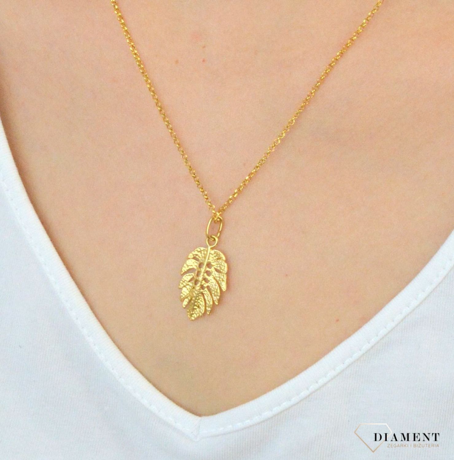 Zawieszka srebrna pozłacana listek 276235480230. Zawieszka srebrna pozłacana. Zawieszka srebrna listek. Zawieszka srebrna w kształcie listka. Zawieszka srebrna pozłacana o modnym wzorze. Zawieszka idealna n.jpg