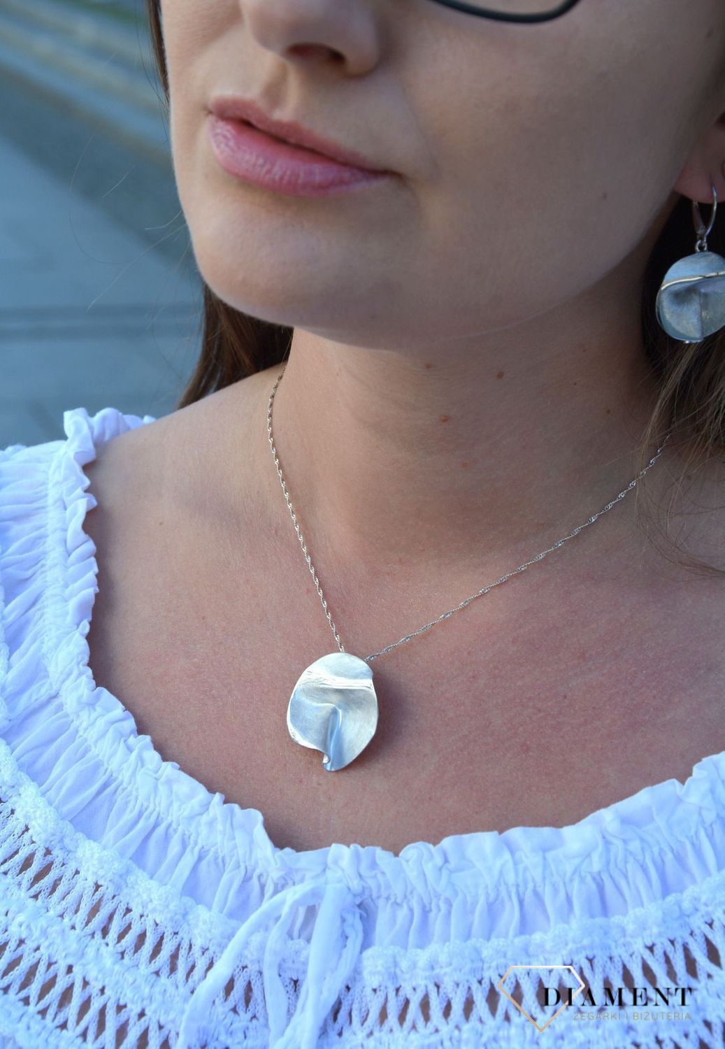 Zawieszka srebrna 'Pogniecione koła' 276271280590.jpg