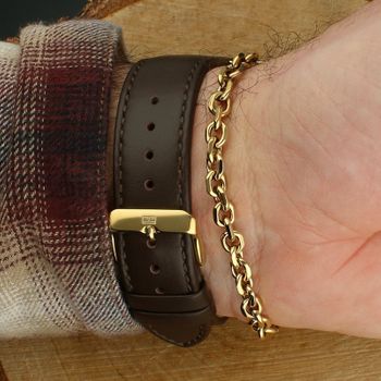 Męski zegarek Tommy Hilfiger Classic 2770221 z kwarcowym mechanizmem Seiko Y121F, złotą kopertą, białą tarczą i skórzanym paskiem. Wodoszczelność 30 m, klasyczny styl.6.jpg