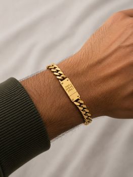 Bransoletka męska Tommy Hilfiger 2780588 złota ze stali szlachetnej z logo tommy.jpg