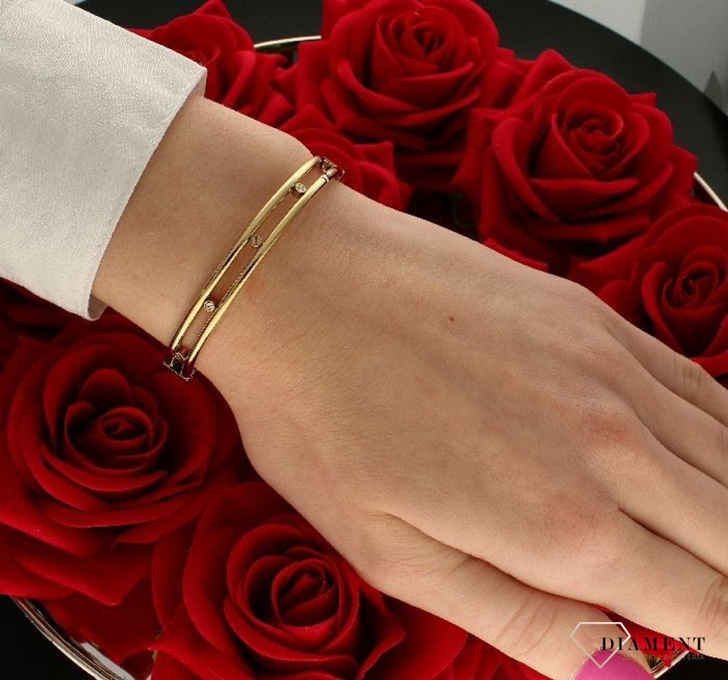 Bransoletka damska złota sztywna TOMMY HILFIGER 2780611.jpg