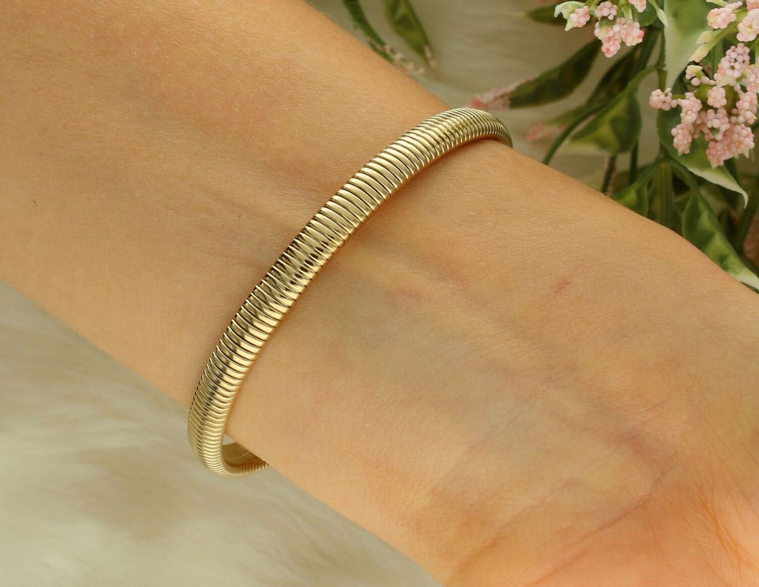 Bransoletka damska Tommy Hilfiger 2781005 złota stal szlachetna.jpg