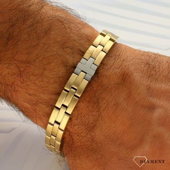 Bransoletka męska Tommy Hilfiger  została wykonana z wysokiej jakości stali szlachetnej i złotej powłoki IP.  Delikatna i elegancka bransoleta przyozdobiona jedną  blaszką w kolorze srebra. Jest to świetny pomysł na.jpg