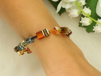 Bransoletka damska Coeur De Lion 2838301131 harmonijna kompozycja syntetycznego tygrysiego oka, kryształów Swarovski®, cyrkonii oraz polaris. Ręcznie wykonana, elegancka biżuteria (4).jpg