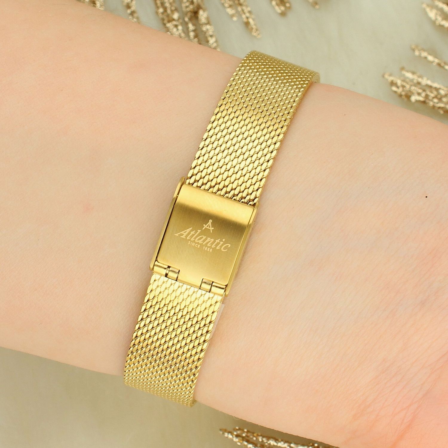 Elegancki damski zegarek Atlantic Elegance Swiss Made. Złota tarcza, szkło szafirowe, mechanizm ETA z datownikiem i fazami księżyca. Styl i precyzja na co dzień.1.jpg