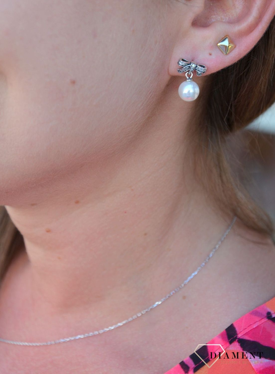 Srebrne kolczyki kokardka z perełką 290596P.jpg