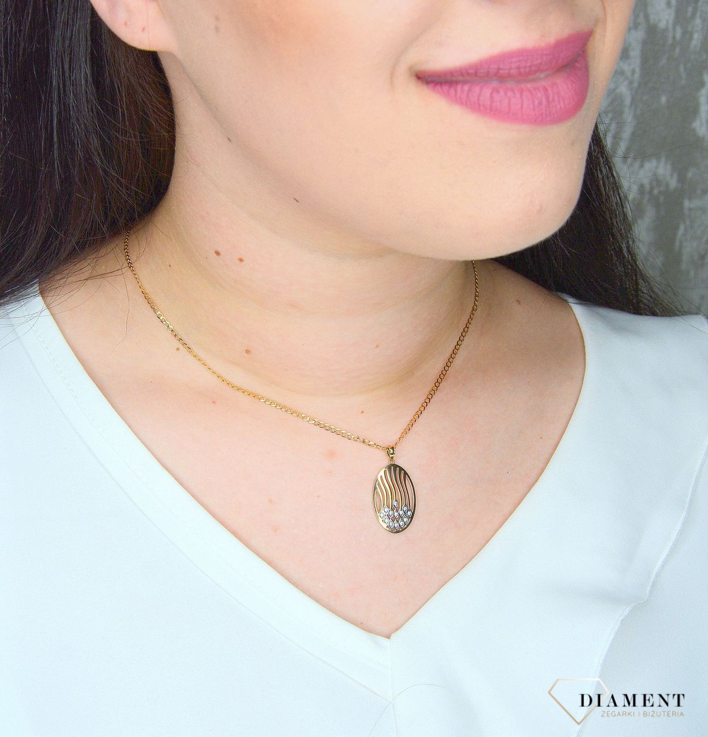 Złota zawieszka 333 owalna z dodatkiem białego złota i cyrkonii 3000131534228.jpg