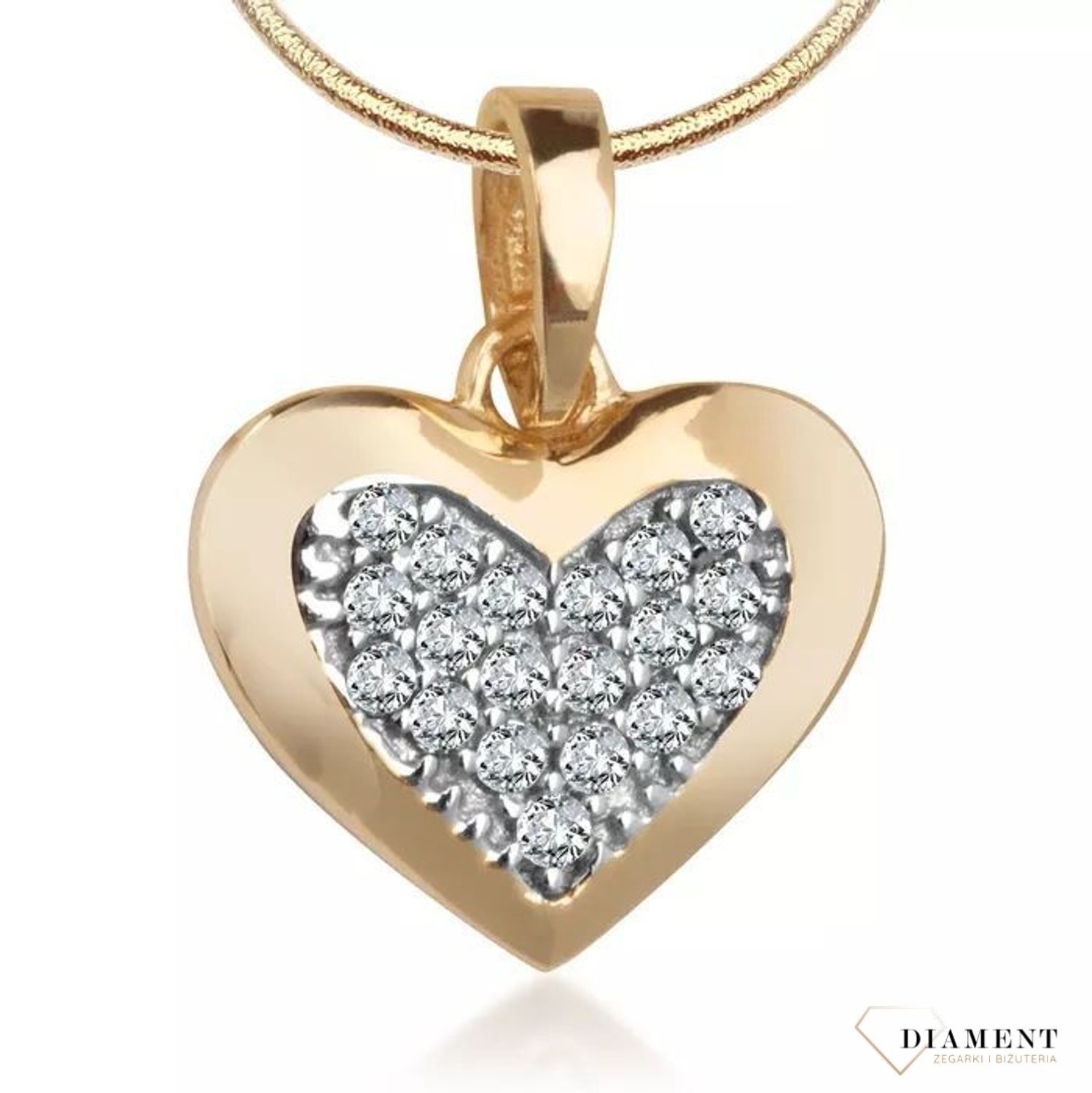 Piękna, złota zawieszka w kształcie serca, wysadzona jasnymi cyrkoniami to znany od lat, ponadczasowy i symboliczny motyw kobiecej biżuterii..jpg