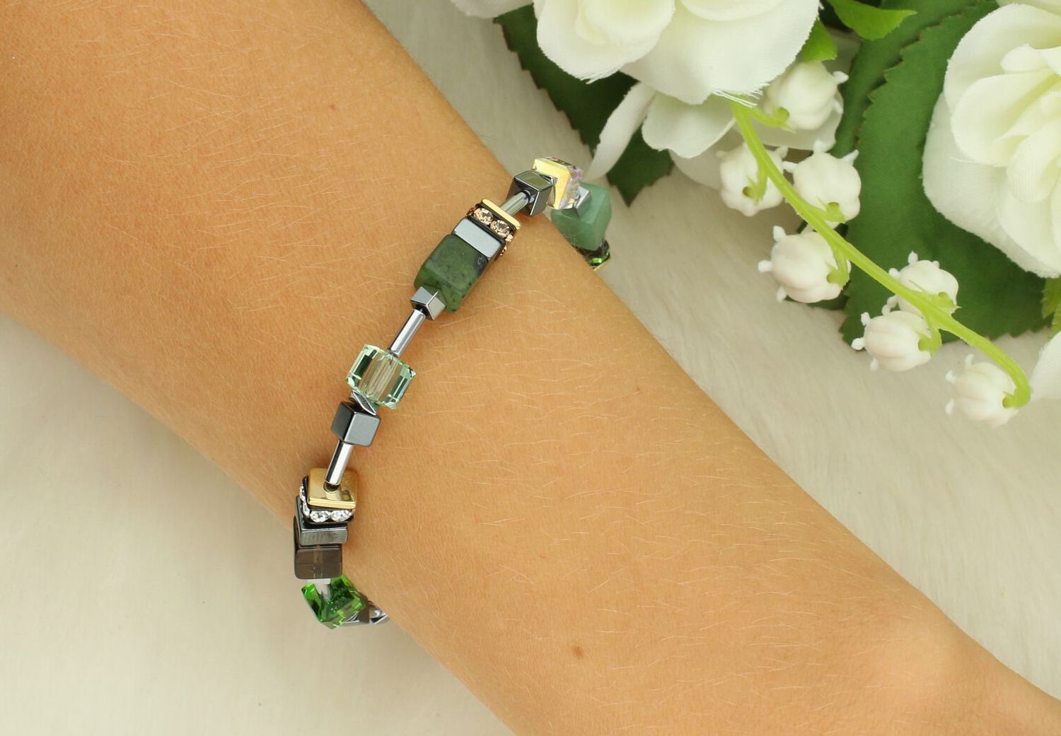 15Bransoletka damska Coeur De Lion GeoCUBE® Precious Motion Forest Light 301730-0500 złota.jpg