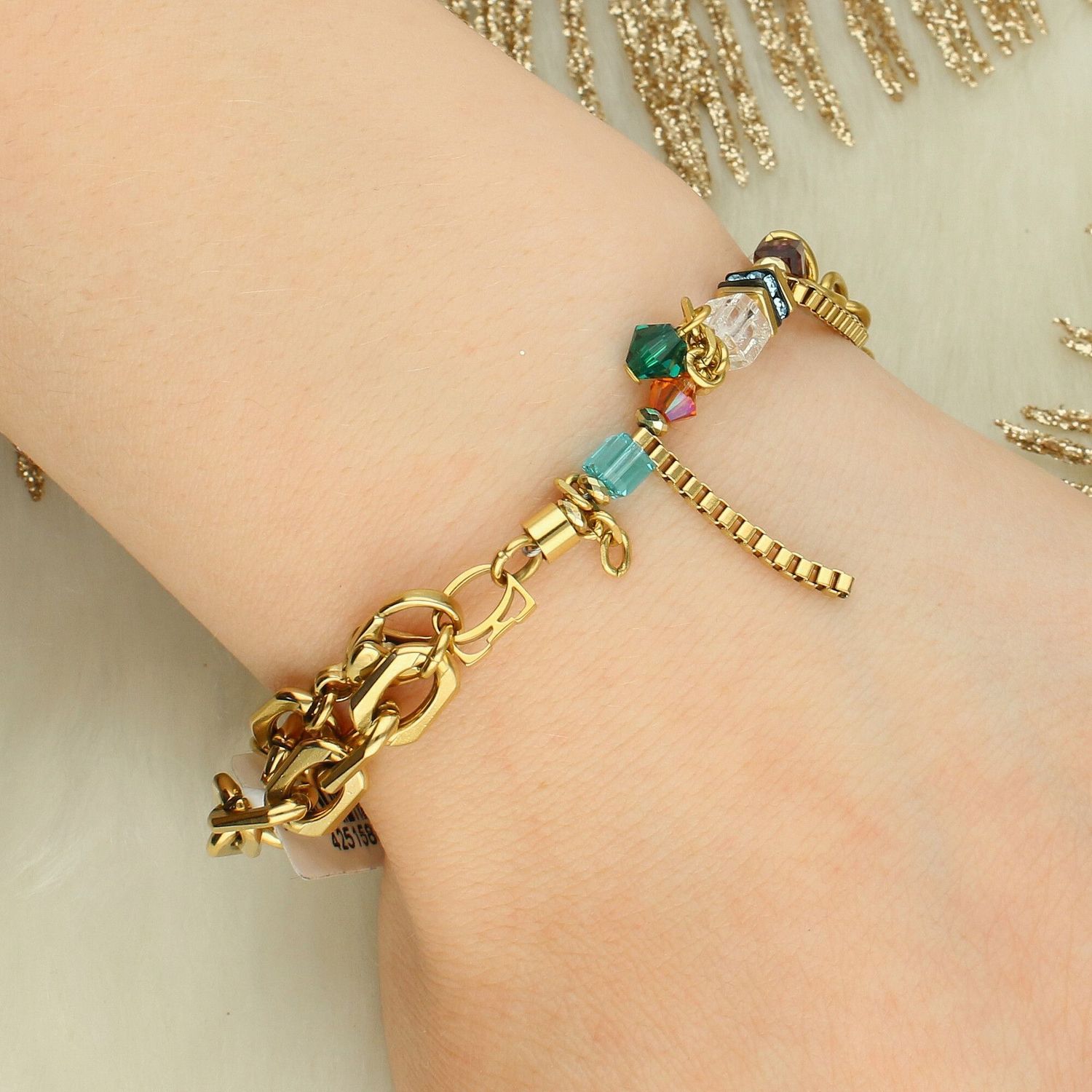 Wyrazista bransoletka Sunray Cube Couture gold-multicolour z kryształami Swarovski®. Złota stal nierdzewna, opcja multi-wear i designerskie etui z certyfikatem.1.jpg