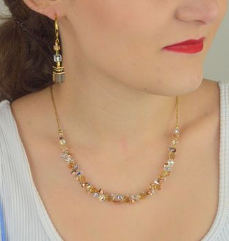 Ekskluzywne kolczyki damskie COEUR DE LION GeoCUBE® 303921-1132 z kryształami Swarovski®, cyrkonią i naturalnym kwarcem dymnym. Ręczne wykonanie, eleganckie opakowanie i 2-letnia gwarancja. Dostępne w salonach Diament.JPG