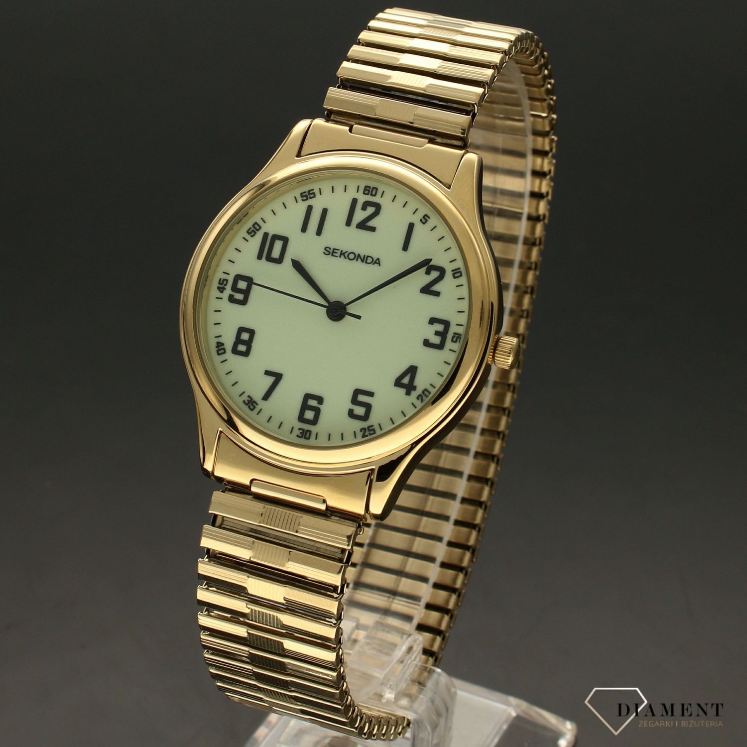 Zegarek męski Sekonda 3244 ✅ Zegarek męski Sekonda w kolorze złotym. ✅ Okrągła koperta i rozciągana bransoleta jest w kolorze złotym, a całość przełamuję biała tarcza z wyraźnymi, czarnymi cyframi arabs.jpg