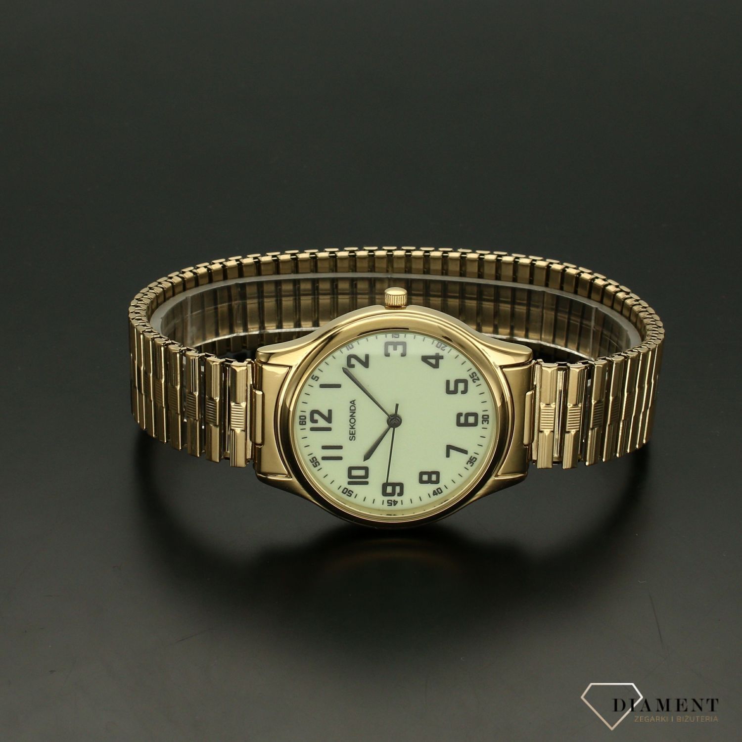 Zegarek męski Sekonda 3244 ✅ Zegarek męski Sekonda w kolorze złotym. ✅ Okrągła koperta i rozciągana bransoleta jest w kolorze złotym, a całość przełamuję biała tarcza z wyraźnymi, czarnymi cyframi arabs.jpg
