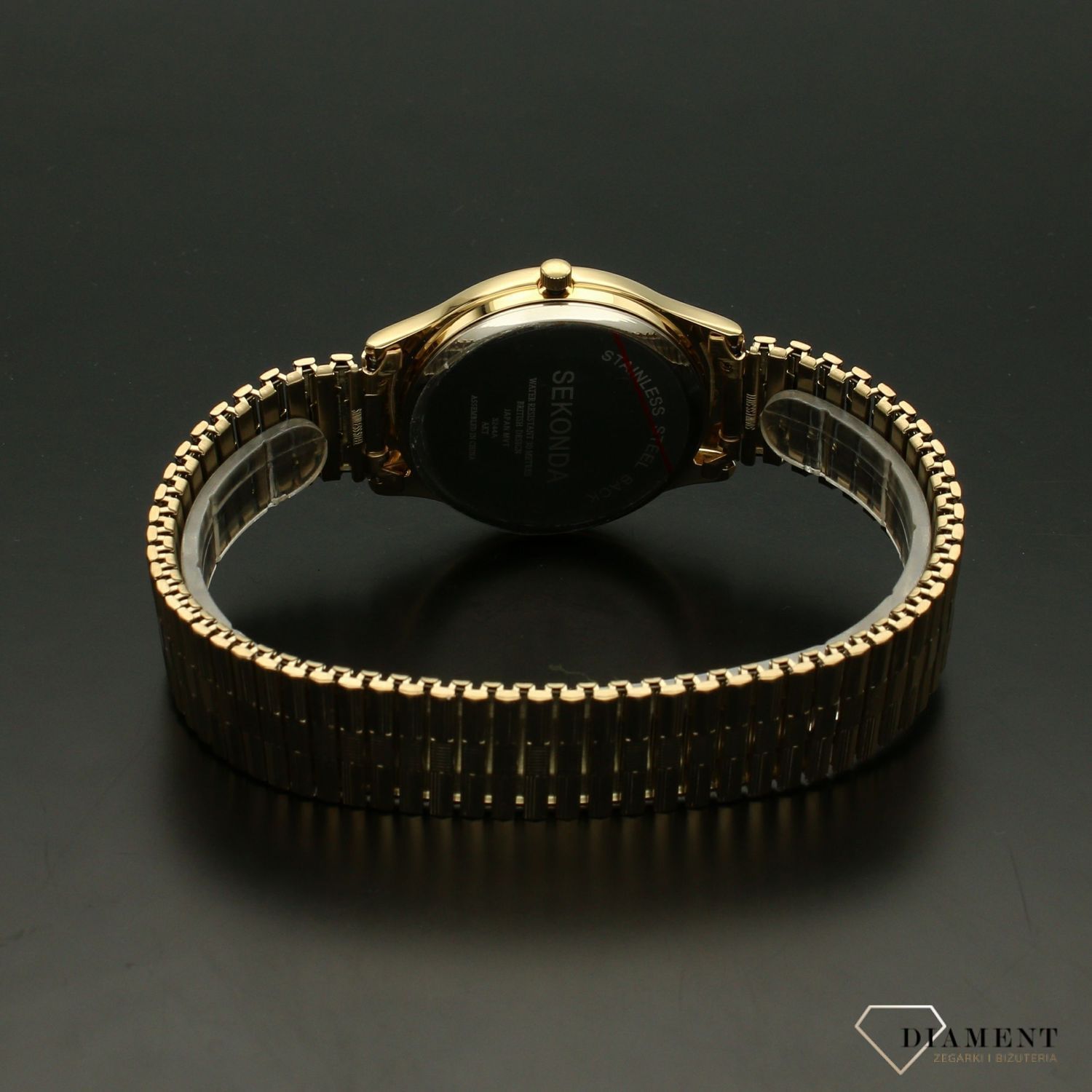 Zegarek męski Sekonda 3244 ✅ Zegarek męski Sekonda w kolorze złotym. ✅ Okrągła koperta i rozciągana bransoleta jest w kolorze złotym, a całość przełamuję biała tarcza z wyraźnymi, czarnymi cyframi arabs.jpg