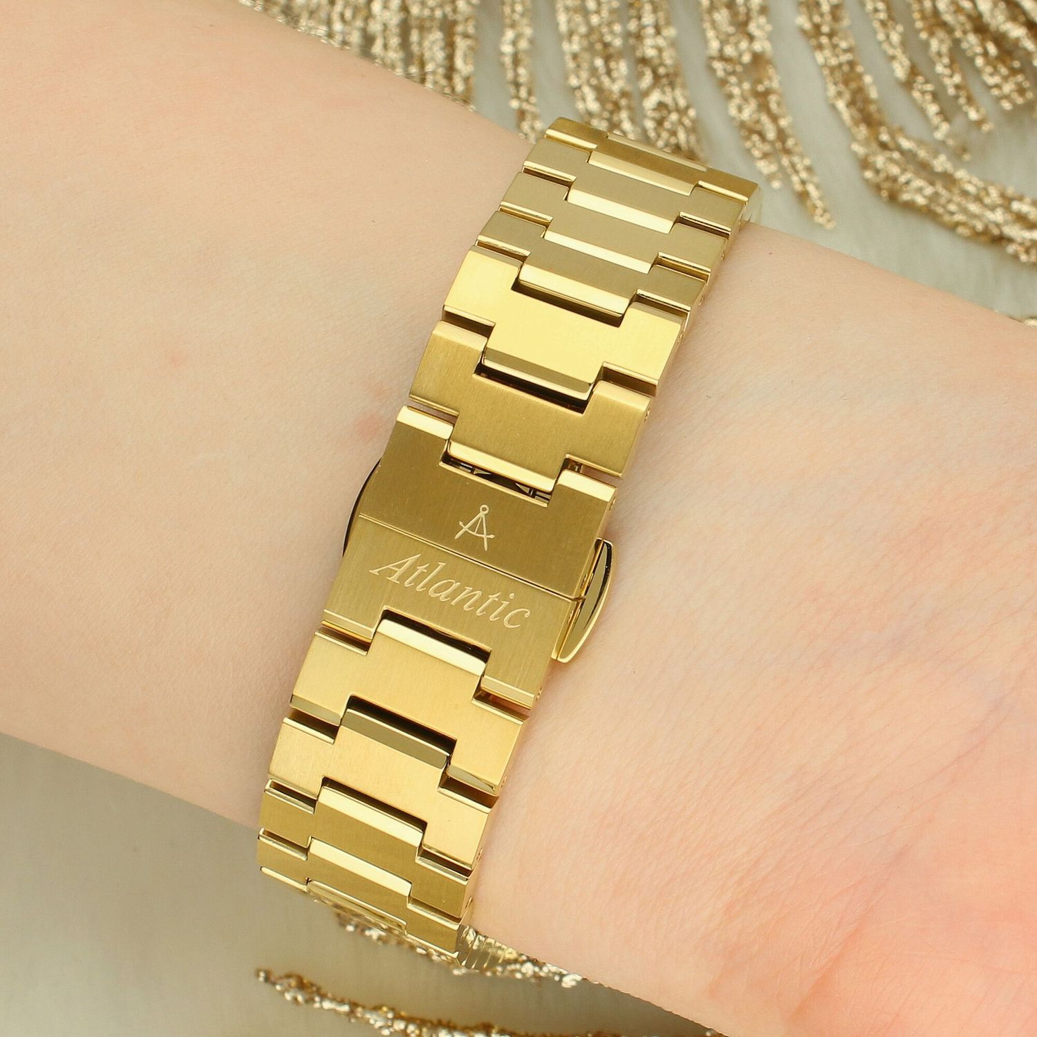 Stylowy zegarek damski Atlantic Seawave Lady Swiss Made. Złota koperta PVD, tarcza sunburst, kryształy, szkło szafirowe i wodoszczelność 100 m.1.jpg