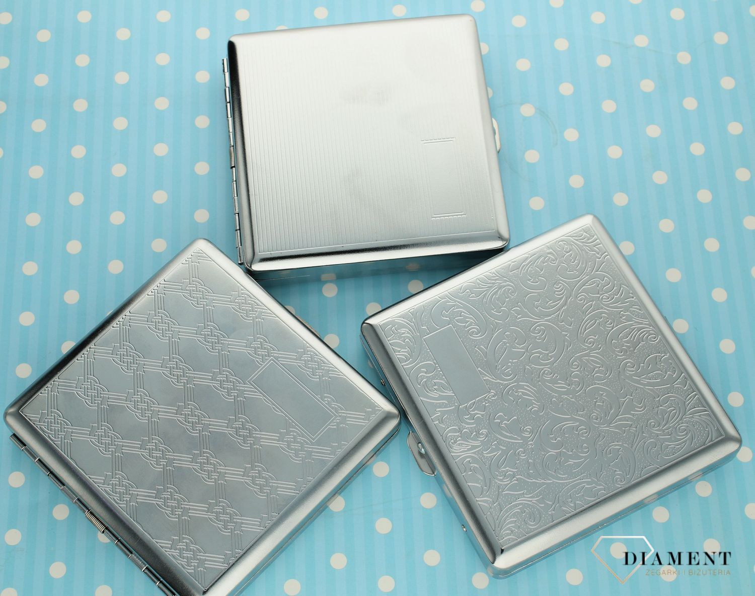 Papierośnica srebra z ozdobnym florystycznym grawerem 40590023D..jpg