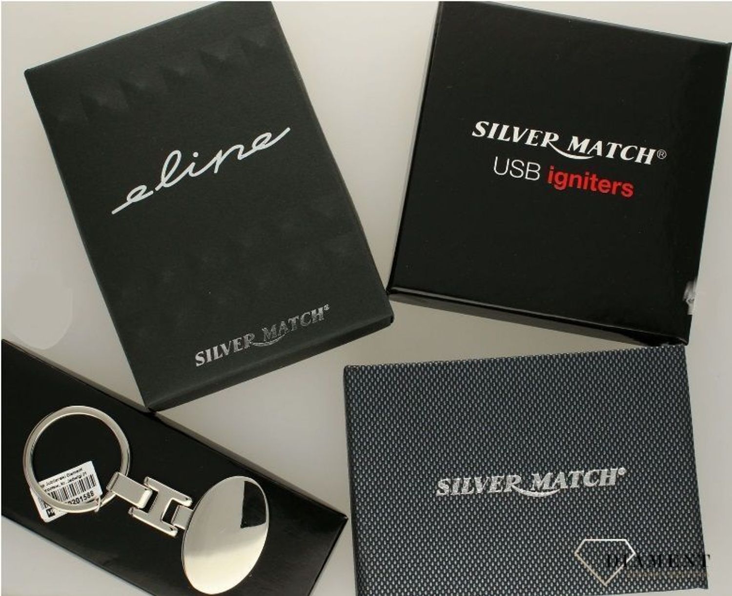 Papierośnica srebra z ozdobnym florystycznym grawerem 40590023D..jpg