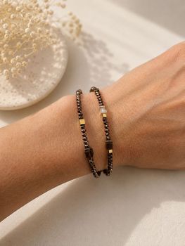 Bransoletka damska Coeur de Lion Joyful Colours Flex Gold-Brown z kryształami Swarovski®, hematytem i złotą stalą nierdzewną. Można nosić ją także jako choker (1).jpg