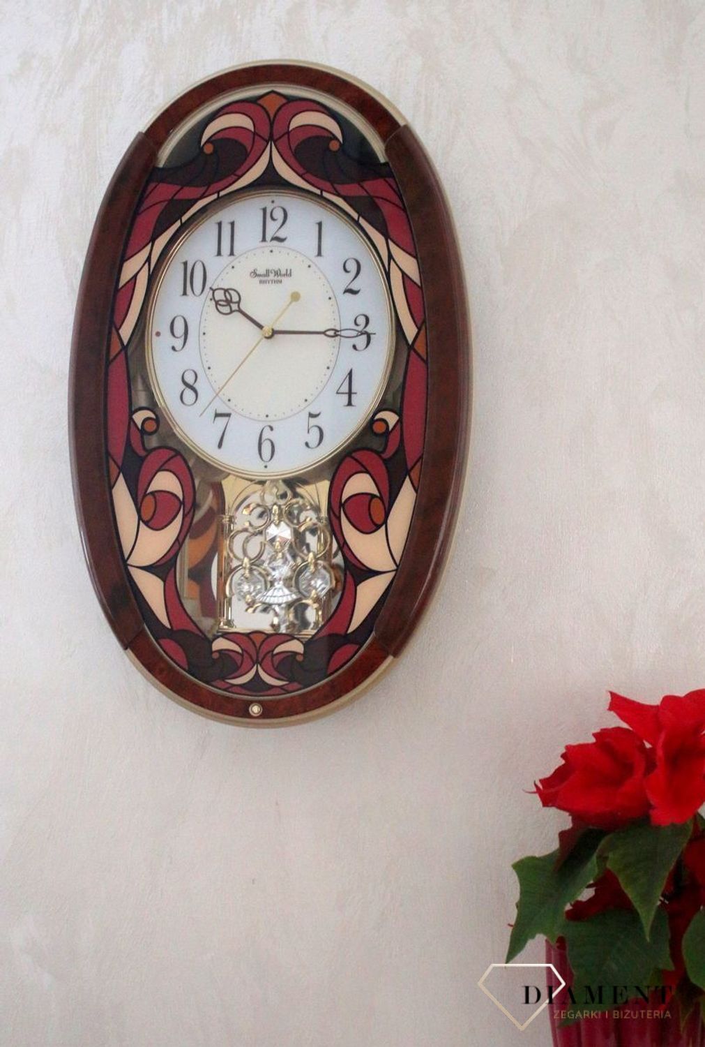 Dekoracyjny zegar ścienny Rhythm 4MJ430WD01 z 22 melodiami, szkłem z kolorowym witrażem i japońskim mechanizmem kwarcowym. Styl i precyzja dla Twojego salonu..jpg
