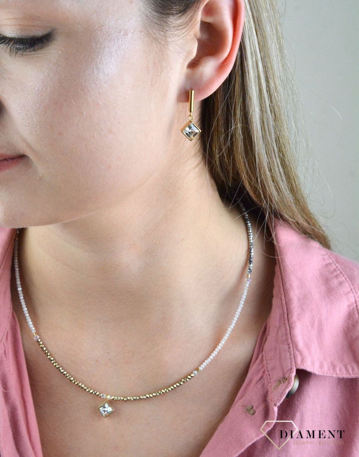 Kolczyki pozłacane wiszące Coeur de Lion z kryształami Swarovski 6006211816. Miłośniczki biżuterii pokochają te wspaniałe kolczyki z nutką ekstrawagancji. Piękne owalne kolczyki z połyskujących kryształków w bi.jpg