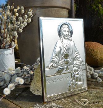 Obrazek srebrny z wizerunkiem Jezusa Chrystusa, który udziela Komunii Św. dziewczynce. To doskonała pamiątka tego ważnego wydarzenia, która odda piękno tego sakramentu (1).JPG