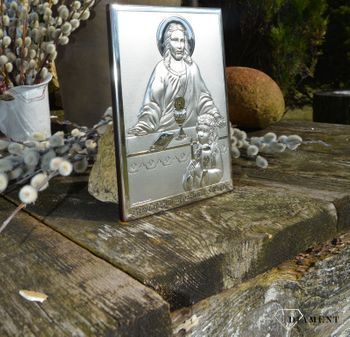 Obrazek srebrny z wizerunkiem Jezusa Chrystusa, który udziela Komunii Św. dziewczynce. To doskonała pamiątka tego ważnego wydarzenia, która odda piękno tego sakramentu (4).JPG