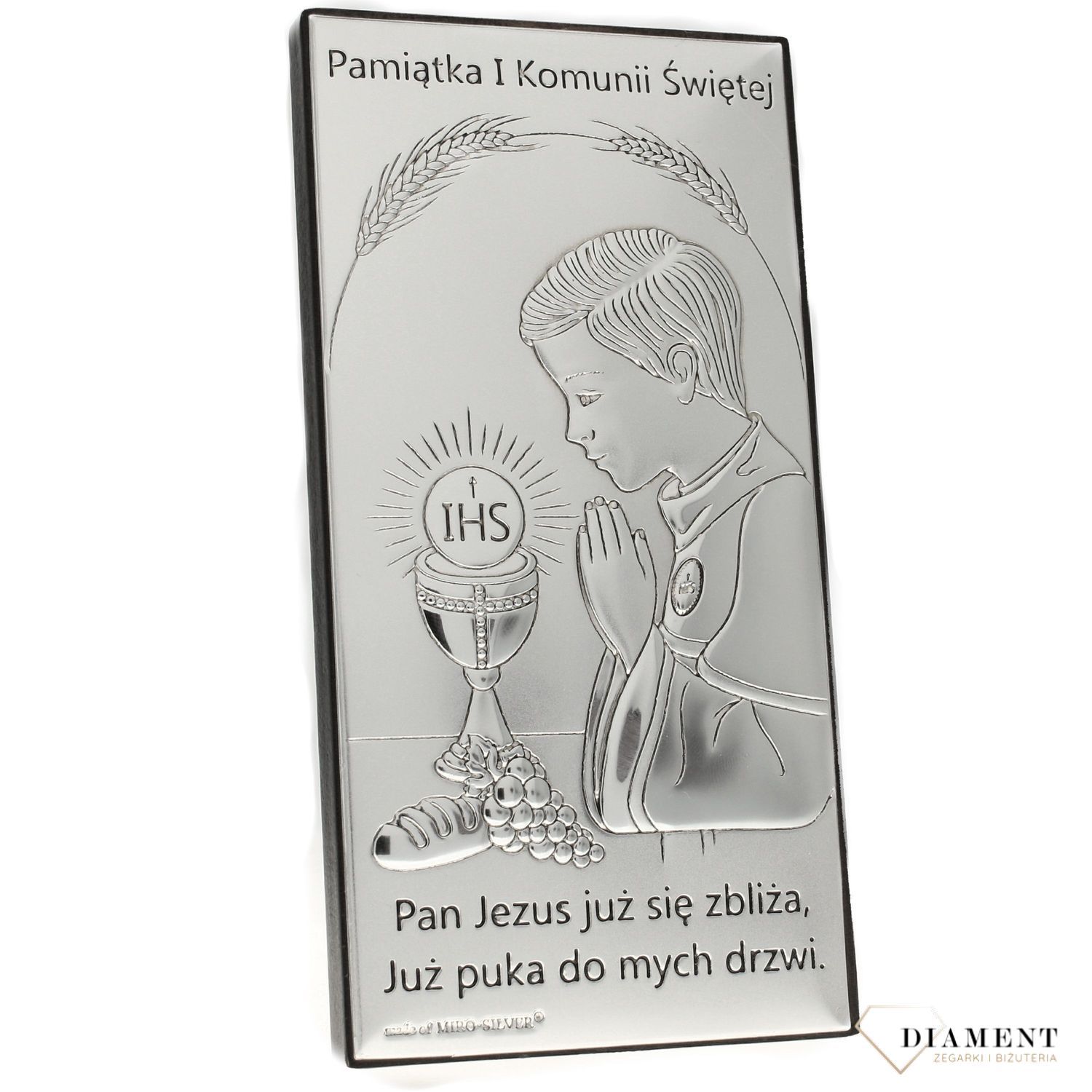 Obrazek srebrny z wizerunkiem chłopca pochylającego się nad kielichem to doskonała pamiątka Pierwszej Komunii Świętej, która odda piękno tego sakramentu (2).jpg
