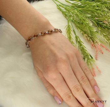Srebrna bransoletka damska z  kamieniem sułtańskim 752657. Srebrna bransoletka została wykonany z próby 925. Bransoletka srebrna jest świetnym dodatkiem, który przyozdobi dłoń pań stawiających na klasykę i subtelność (1).jpg