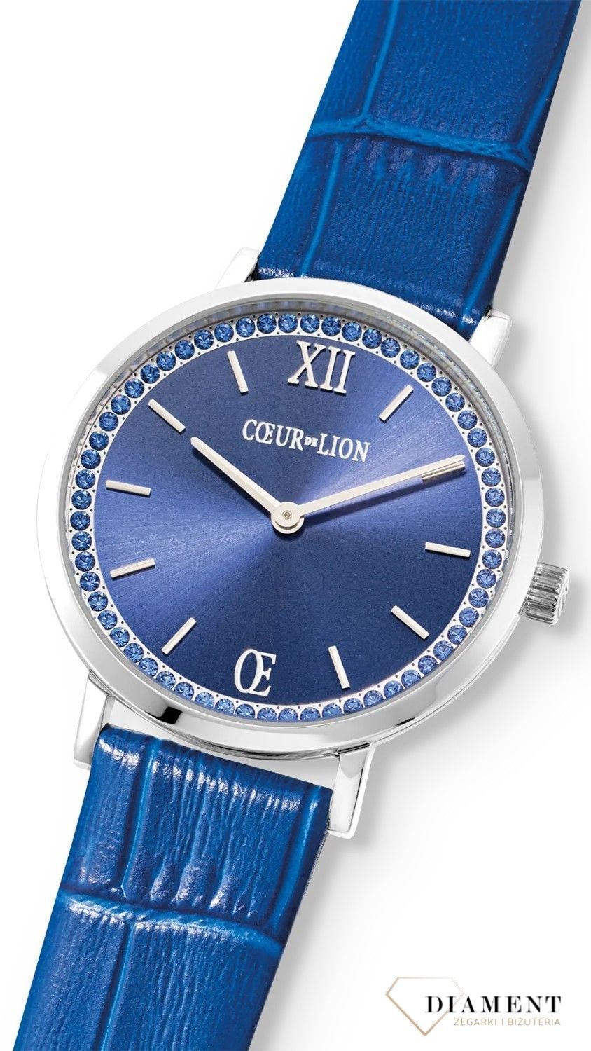 Zegarek damski na niebieskim pasku Coeur de Lion 7650710707. Piękny zegarek ozdobiony kryształami Swarovskiego. Zegarek z niebieskim paskiem z wzorem aligatora. Piękne uzupełnienie każdej damskiej stylizacji. Ze.jpg
