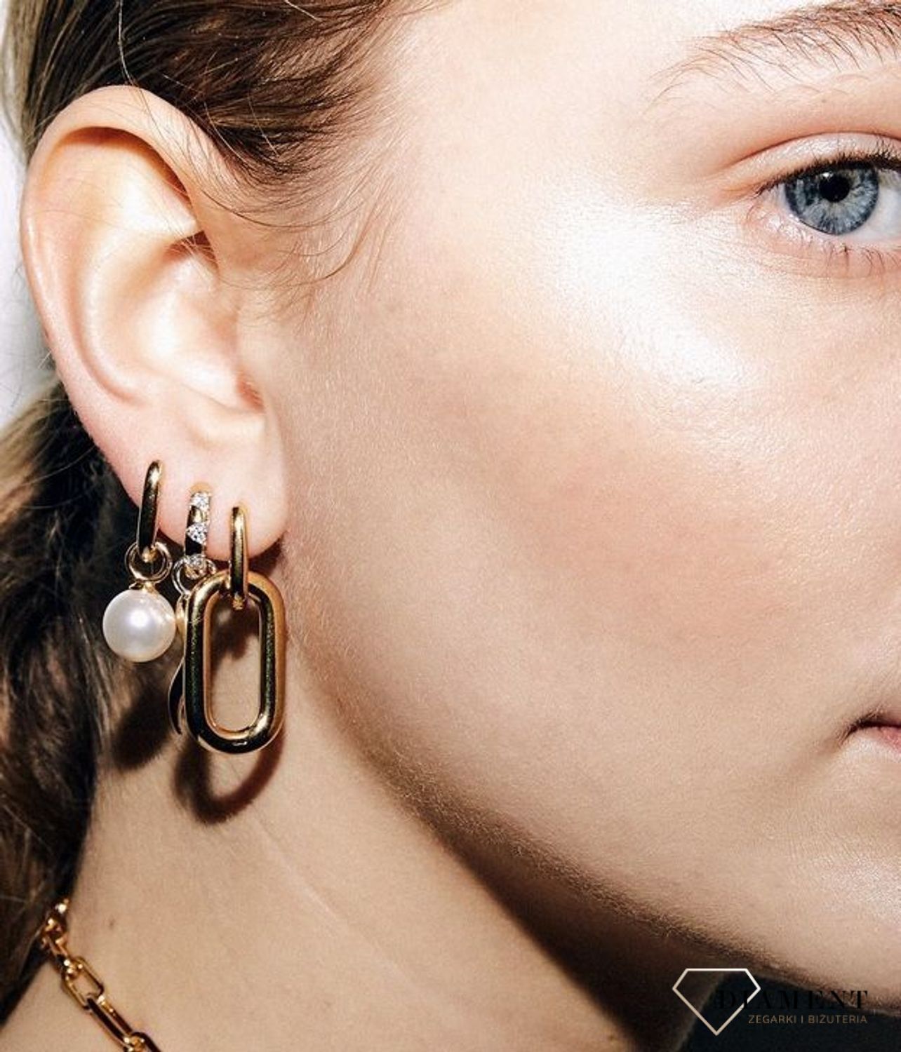 Srebrne kolczyki TI SENTO cyrkonia z trójkątami w złocie 7838ZY. Pozłacane okrągłe, kolczyki damskie koła wydają się być jednym z najbardziej uniwersalnych (3).jpg