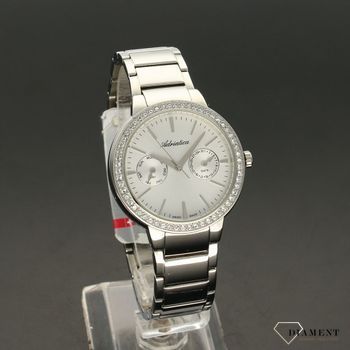 Zegarek damski biżuteryjny z piękną stalową bransoletą. Tarcza zegarka dookoła jest ozdobiona kryształami Swarovskiego. Tarcza zegarka w srebrnym kolorze.  (2).jpg
