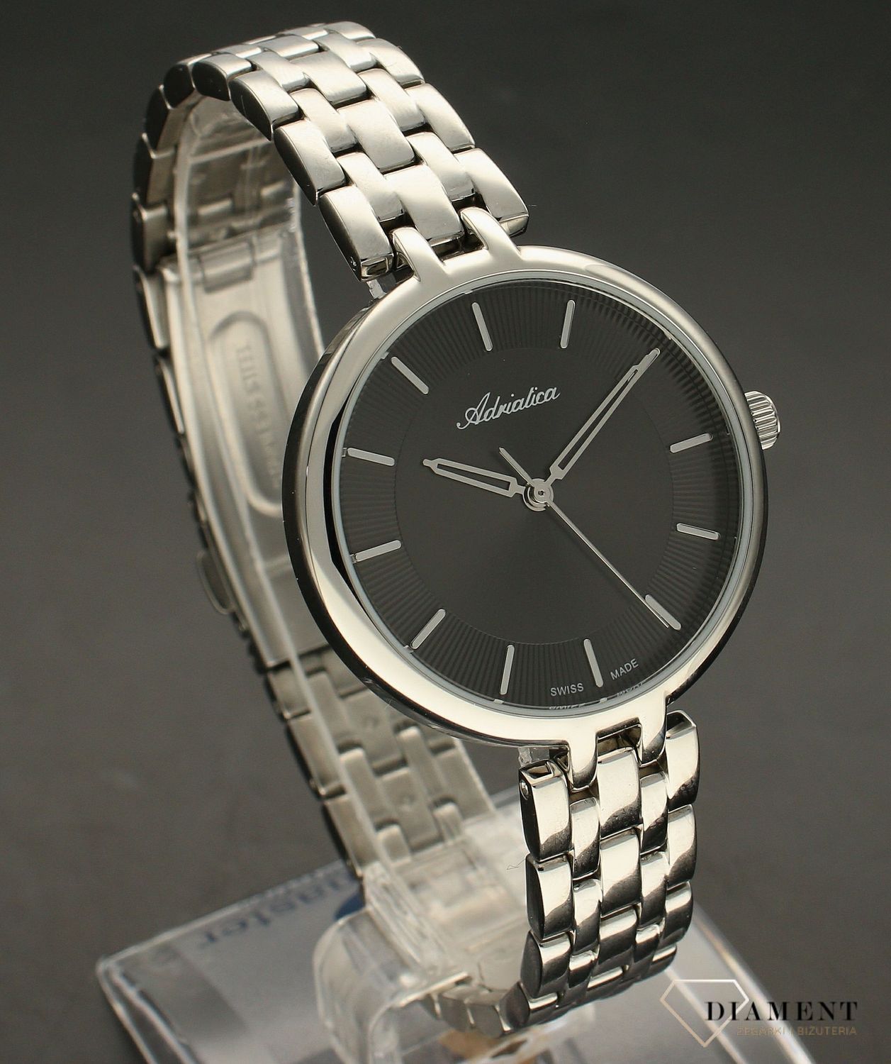 Zegarek damski na bransolecie Adriatica A3763.5116Q. Zegarek z czarną tarczą, srebrnymi indeksami oraz wskazówkami. Idealny na prezent dla kobiety..webp
