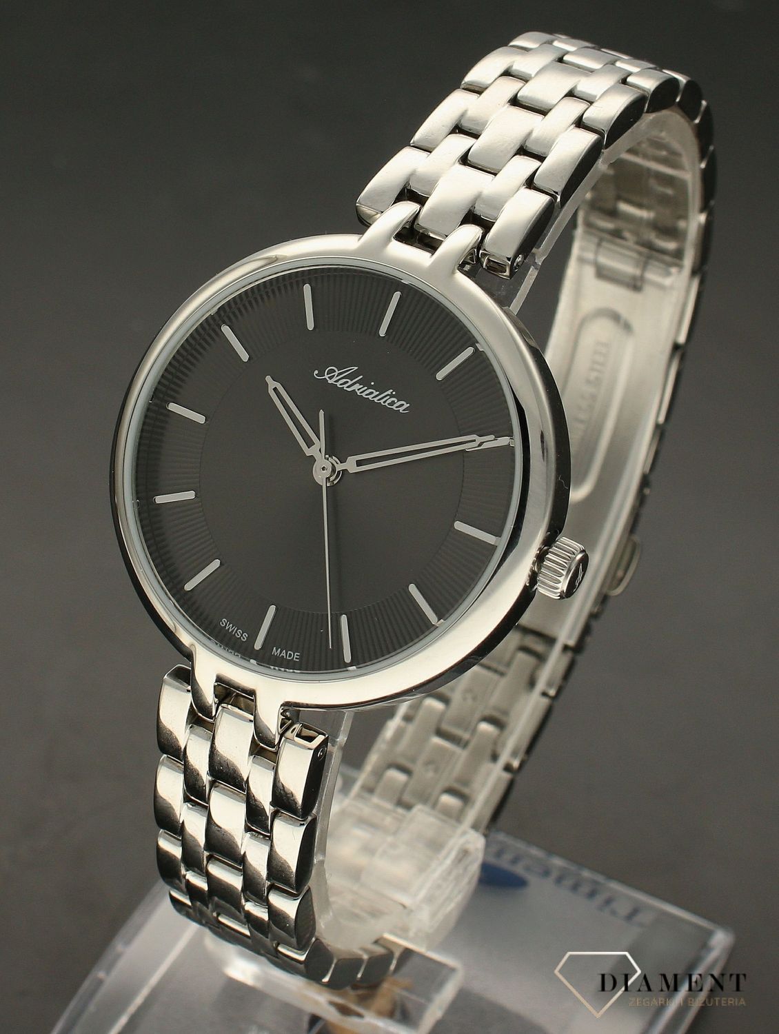 Zegarek damski na bransolecie Adriatica A3763.5116Q. Zegarek z czarną tarczą, srebrnymi indeksami oraz wskazówkami. Idealny na prezent dla kobiety..webp