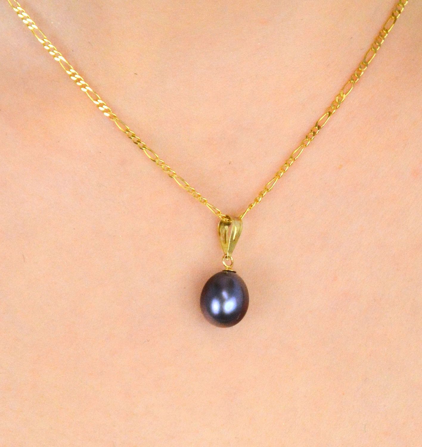 Zawieszka złota próba 585, z perłą fioletową AR012-2712 Elegancja w wyjątkowym kolorze – złota zawieszka z fioletową perłą1.jpg