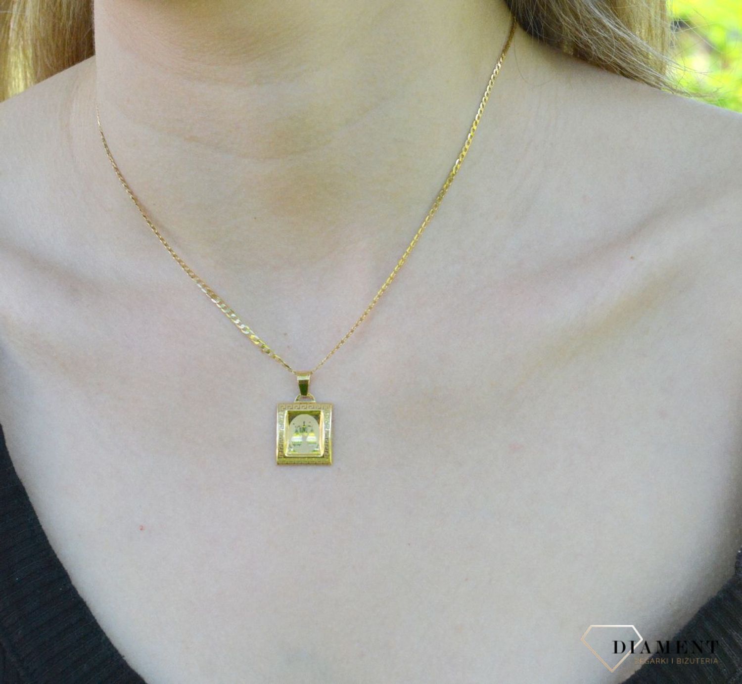 Złota zawieszka 585 znak zodiaku Waga AR18-184. Zawieszka została wykonana ze złota próby 585. Zawieszka będzie pięknym prezentem dla bliskiej osoby spod znaku wagi. W naszej ofercie dostępne są także naszyjniki i zawieszki z.jpg