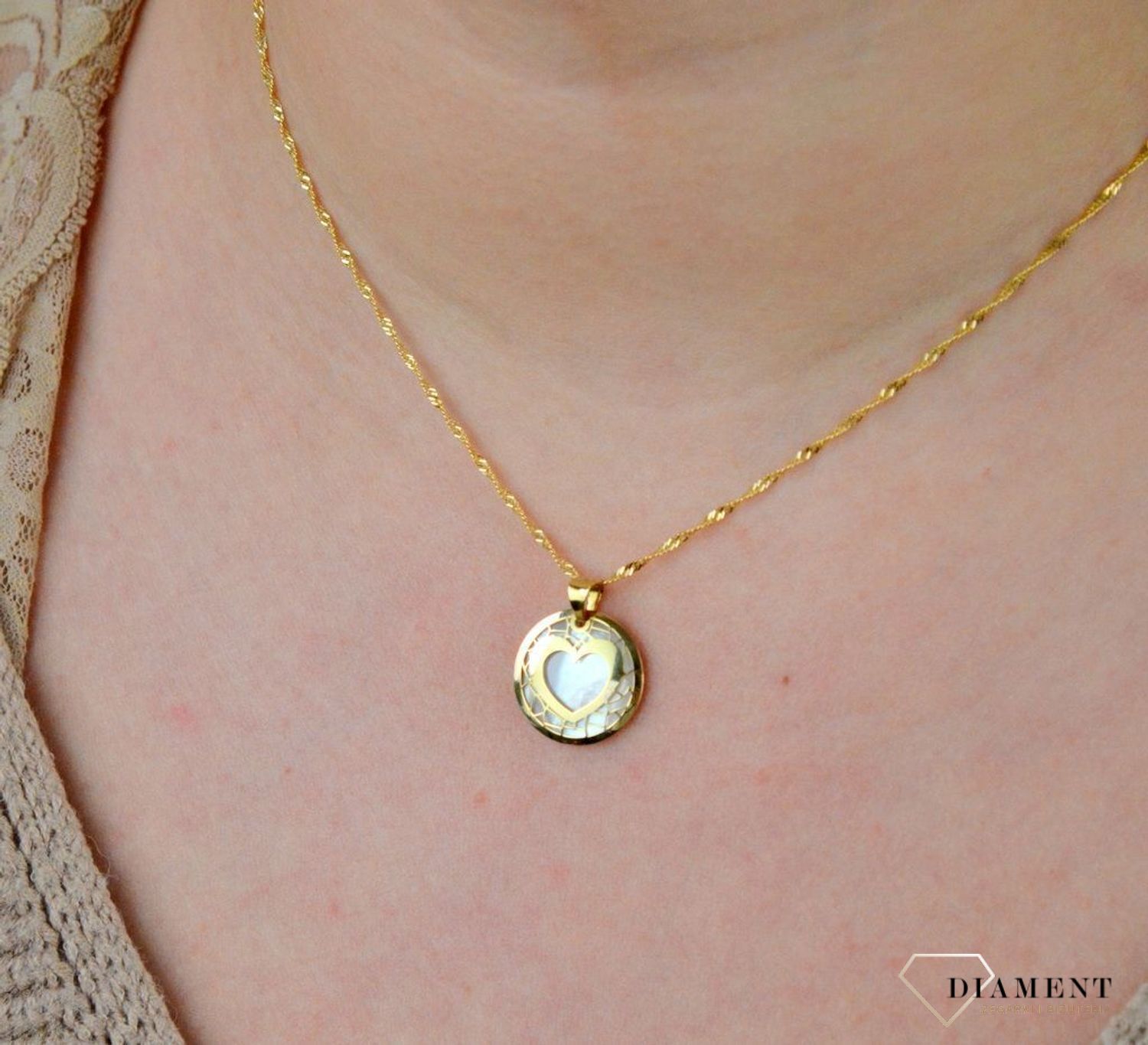 Złota zawieszka 585 serduszko z masą perłową AR521-8165 (1).jpg