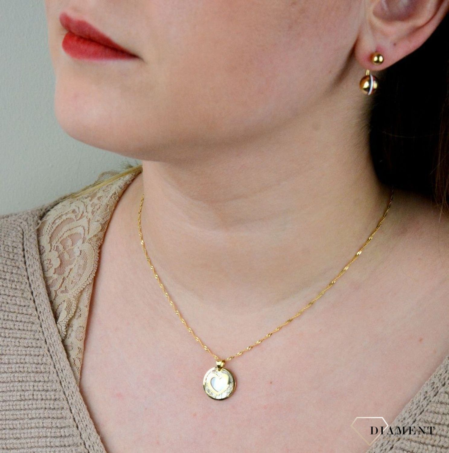 Złota zawieszka 585 serduszko z masą perłową AR521-8165 (1).jpg